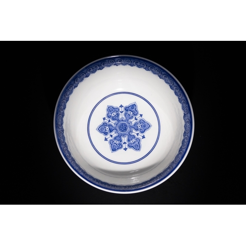 119 - A Chinese Blue and White Porcelain Bowl with Floral and Scroll Motifs & Six Character Marks to the B... 