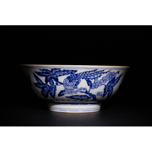 120 - A Chinese Blue & White Porcelain Bowl with Grapevine Motifs & Six Character Marks to the Base.

This... 