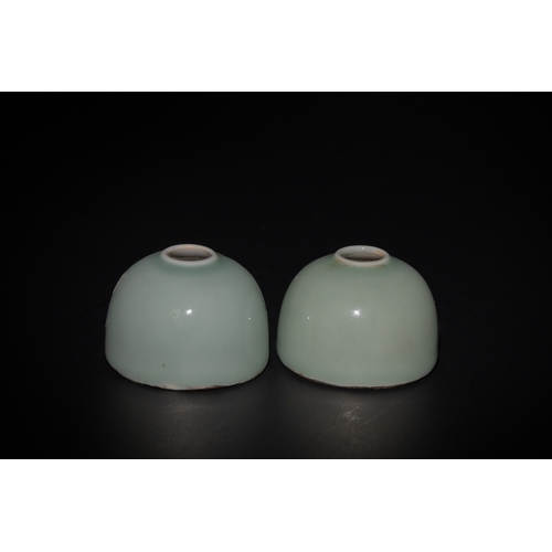 122 - A Pair of Chinese Celadon Porcelain Inkwells with Six Character Marks to the Base.

This pair of cel... 