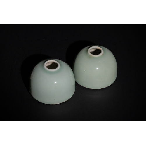 122 - A Pair of Chinese Celadon Porcelain Inkwells with Six Character Marks to the Base.

This pair of cel... 