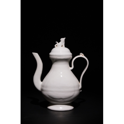 129 - A Chinese Blanc-de-Chine Ewer with Dog Finial with a Mark to the Base.

A Chinese blanc-de-chine por... 