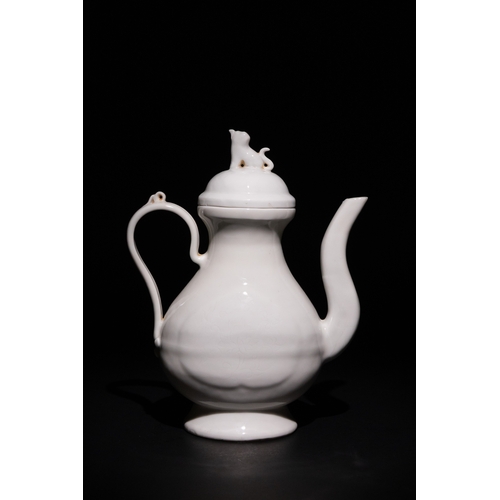 129 - A Chinese Blanc-de-Chine Ewer with Dog Finial with a Mark to the Base.

A Chinese blanc-de-chine por... 