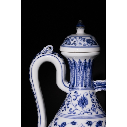 130 - A Chinese Blue and White Porcelain Ewer with Floral Motifs and Curved Handle & Six Character Marks t... 