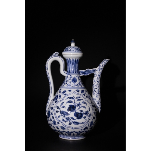 130 - A Chinese Blue and White Porcelain Ewer with Floral Motifs and Curved Handle & Six Character Marks t... 