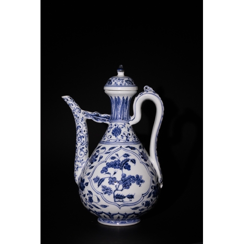 130 - A Chinese Blue and White Porcelain Ewer with Floral Motifs and Curved Handle & Six Character Marks t... 