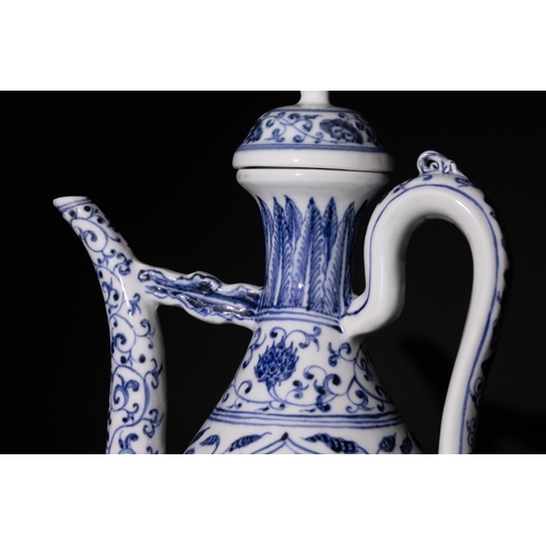 130 - A Chinese Blue and White Porcelain Ewer with Floral Motifs and Curved Handle & Six Character Marks t... 