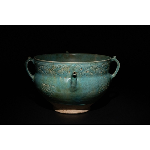 12 - An Islamic Khorassan Glazed Ceramic Bowl with Intricate Motifs and Handles, 12th Century.

This Isla... 