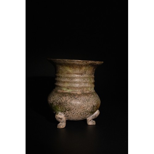 309 - **NO RESERVE**

A Chinese Jade Tripod Vase with a Weathered Green Patina.

A Chinese jade vase stand... 