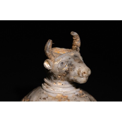 43 - **NO RESERVE**

An Islamic Glass Bull-Form Vessel with a Domed Body, Possibly Ancient.

A sculptural... 