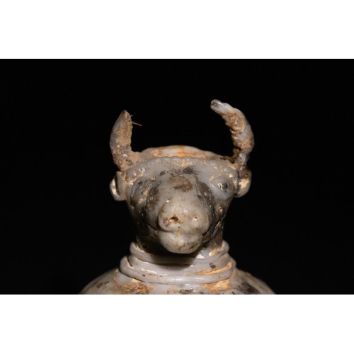 43 - **NO RESERVE**

An Islamic Glass Bull-Form Vessel with a Domed Body, Possibly Ancient.

A sculptural... 