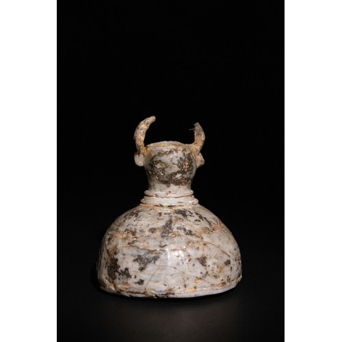 43 - **NO RESERVE**

An Islamic Glass Bull-Form Vessel with a Domed Body, Possibly Ancient.

A sculptural... 