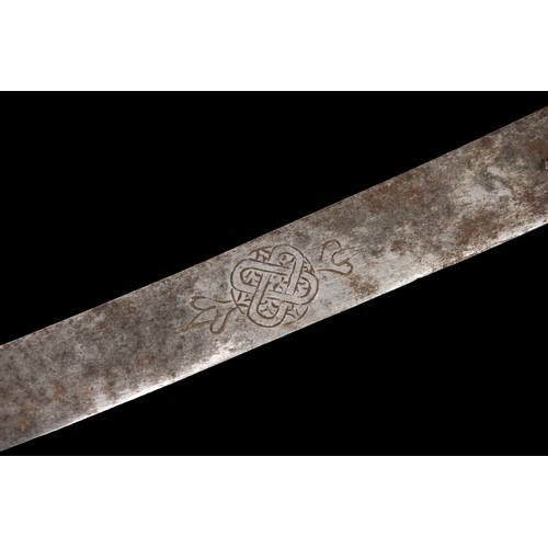 16 - A Timurid-Mughal Inscribed Sword with Silver Wirework.

A Timurid-Mughal saber featuring a deeply cu... 