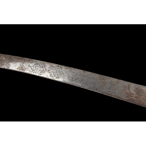 16 - A Timurid-Mughal Inscribed Sword with Silver Wirework.

A Timurid-Mughal saber featuring a deeply cu... 