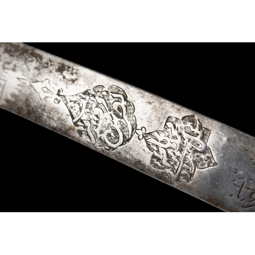 16 - A Timurid-Mughal Inscribed Sword with Silver Wirework.

A Timurid-Mughal saber featuring a deeply cu... 