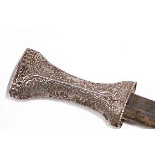 17 - A Qajar Silver Inlaid Dagger with Hunting Scene Motifs.

A Qajar dagger featuring a curved blade and... 