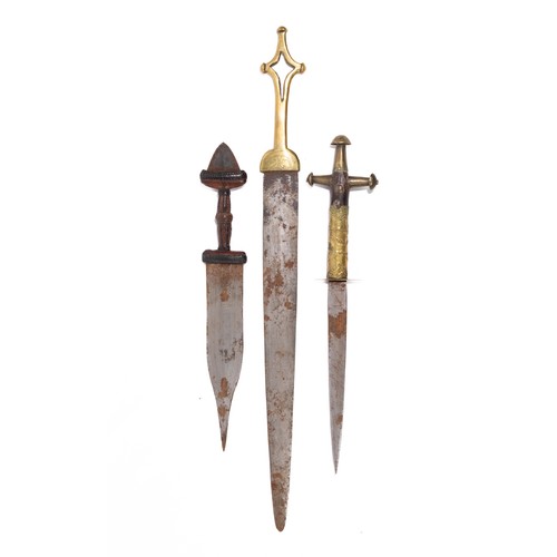 314 - **NO RESERVE**

A Lot of Three African Arm Daggers with Brass and Leather Sheaths.

A lot of three a... 