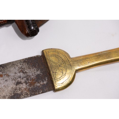 314 - **NO RESERVE**

A Lot of Three African Arm Daggers with Brass and Leather Sheaths.

A lot of three a... 