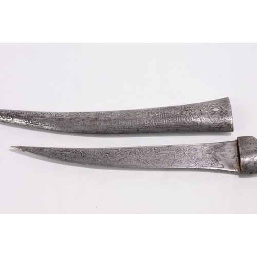 53 - **NO RESERVE**

A Persian Iron Dagger with Islamic Calligraphy and Floral Engraving.

A Persian dagg... 