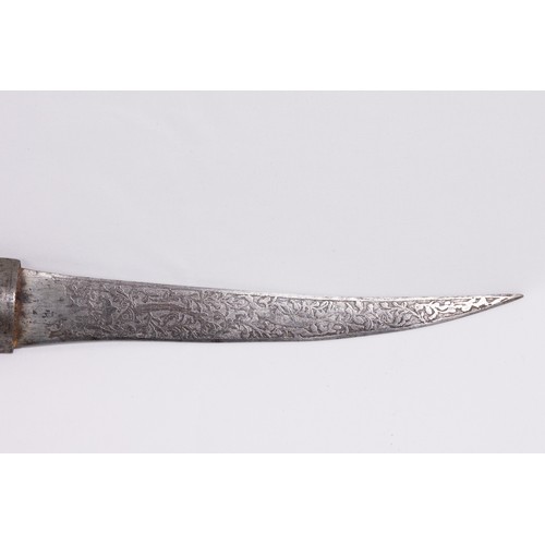 53 - **NO RESERVE**

A Persian Iron Dagger with Islamic Calligraphy and Floral Engraving.

A Persian dagg... 