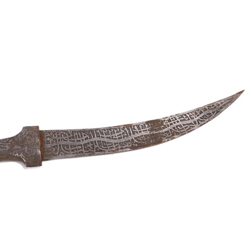 54 - **NO RESERVE**

A Persian Iron Dagger with Islamic Calligraphy and Engraved Hunting Motifs.

An elon... 