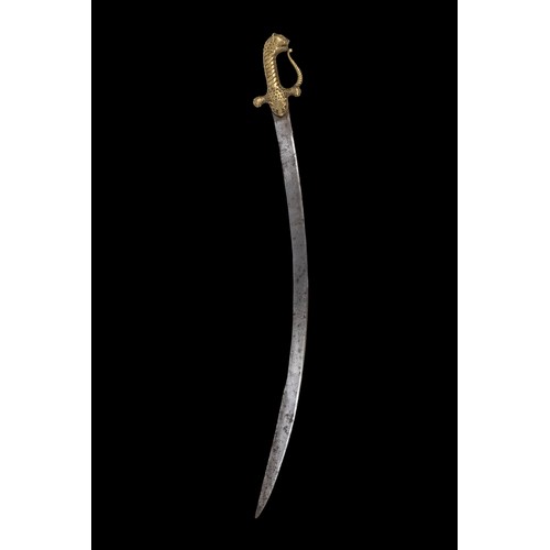 A Rare Indian Tipu Sultan’s Armoury Tulwar Sword, Mysore, 1751–1799.

This child tulwar sword features an elaborately gilded hilt in the form of a snarling tiger’s head, a motif famously associated with Tipu Sultan (1751–1799), the Tiger of Mysore. The sculptural grip is adorned with intricate detailing, including a ribbed handle that mimics a tiger’s tail, flanked by two fierce feline heads at the cross guard. The recurved knuckle guard extends elegantly, terminating in another stylized tiger’s head.

L: Approximately 62.5cm

Provenance:
From the collection of a British gentleman, formerly a history professor, assembled over several decades