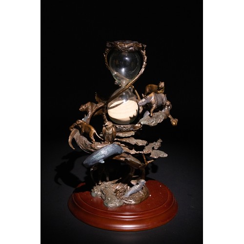 318 - **NO RESERVE**

A Franklin Mint Bronze ‘Living Earth’ Hourglass.

A sculptural bronze hourglass by F... 