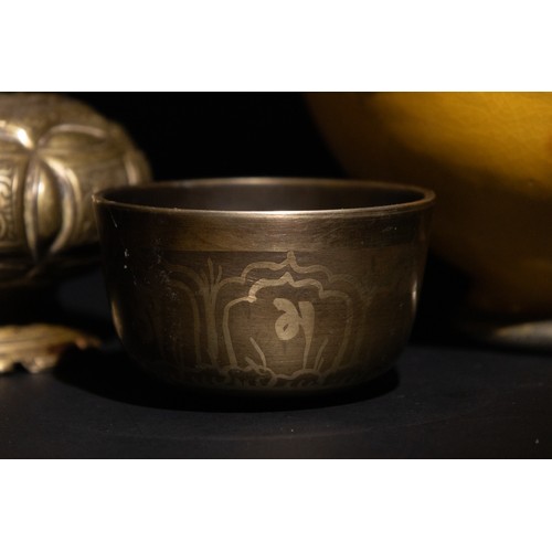 60 - **NO RESERVE**

A Lot of Four Eastern Vessels Including a Moroccan Safi Yellow Bowl.

A Moroccan Saf... 