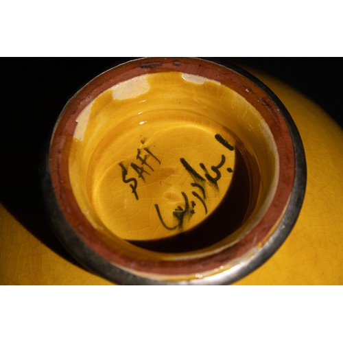 60 - **NO RESERVE**

A Lot of Four Eastern Vessels Including a Moroccan Safi Yellow Bowl.

A Moroccan Saf... 