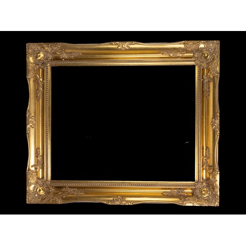 321 - **NO RESERVE**

A Gilded Rococo-Style Picture Frame by Larson Juhl and a Carved Floral Wall Plaque.
... 