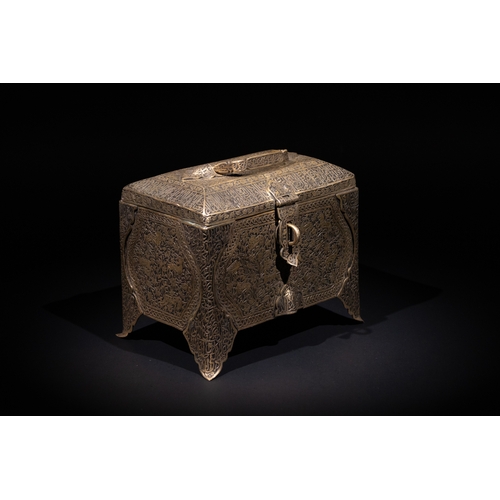 26 - An Islamic Iron Lidded Casket with Arabic Inscriptions and Figural Motifs.

A finely crafted iron ca... 