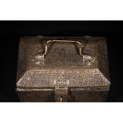 26 - An Islamic Iron Lidded Casket with Arabic Inscriptions and Figural Motifs.

A finely crafted iron ca... 