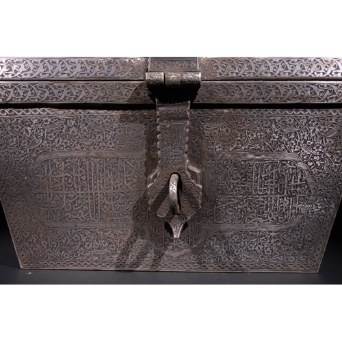 29 - An Islamic Iron Lidded Storage Box with Engraved Arabic Calligraphy.

A robust iron lidded box featu... 