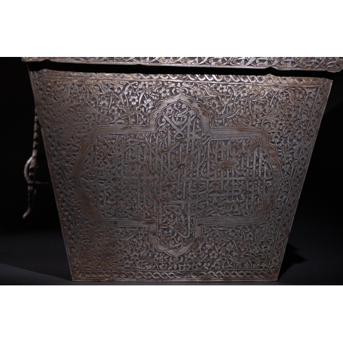 29 - An Islamic Iron Lidded Storage Box with Engraved Arabic Calligraphy.

A robust iron lidded box featu... 