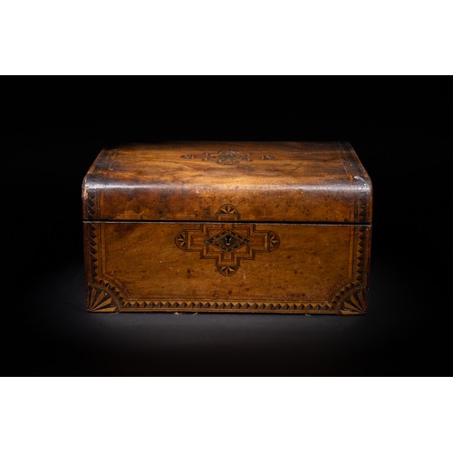 325 - **NO RESERVE**

A Wooden Inlaid Lidded Box with Geometric Motifs, Possibly Victorian.

A rectangular... 