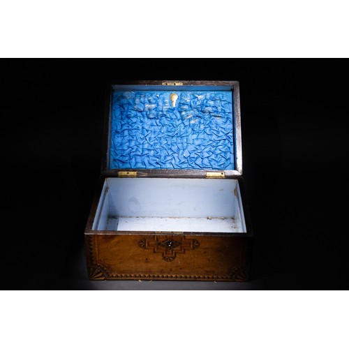 325 - **NO RESERVE**

A Wooden Inlaid Lidded Box with Geometric Motifs, Possibly Victorian.

A rectangular... 