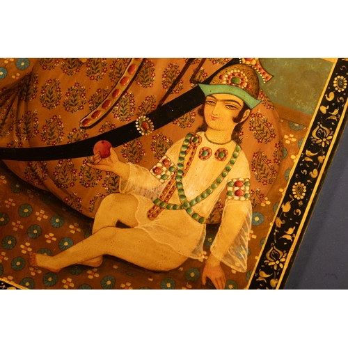 3 - A Qajar Lacquer Panel Depicting a Nobleman with a Child, 19th Century.

A finely painted Qajar lacqu... 