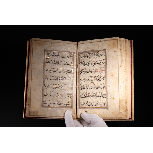 12 - An Illuminated Qajar Prayer Manuscript in Gilded Script, Early 19th Century.

A finely illuminated I... 