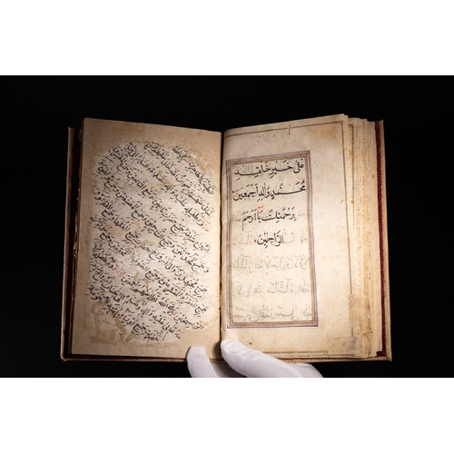 12 - An Illuminated Qajar Prayer Manuscript in Gilded Script, Early 19th Century.

A finely illuminated I... 