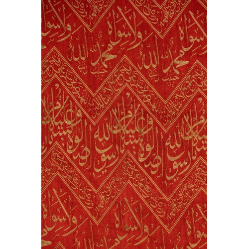 16 - An Ottoman Fragment of the Kaaba Kiswa.

Crafted in rich crimson with woven threaded inscriptions, t... 