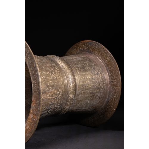 20 - A Mamluk Style Islamic Brass Tray Stand with Arabic Inscriptions.

An Islamic brass tray stand featu... 