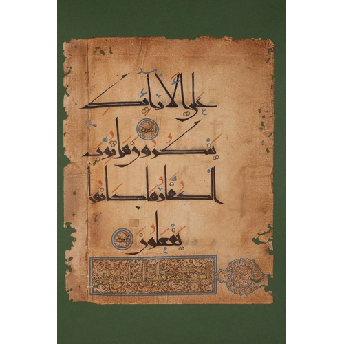23 - A North African Mamluk-Style Framed Illuminated Quran Page.

A hand-painted folio from a North Afric... 