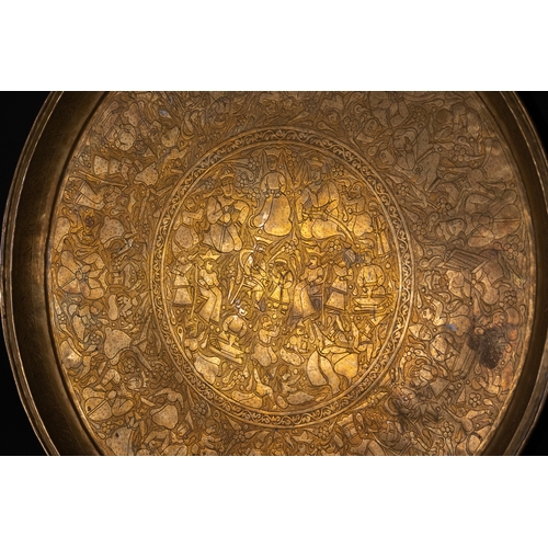 27 - A Qajar Brass Tray with Courtly Scene, Persia, 19th–20th Century.

A finely engraved brass tray feat... 