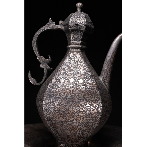 37 - A Safavid Tinned Copper Ewer with Basin, 17th Century.

This Safavid set comprises a tinned copper e... 