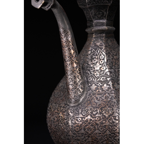 37 - A Safavid Tinned Copper Ewer with Basin, 17th Century.

This Safavid set comprises a tinned copper e... 