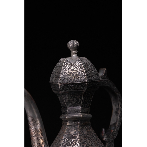 37 - A Safavid Tinned Copper Ewer with Basin, 17th Century.

This Safavid set comprises a tinned copper e... 