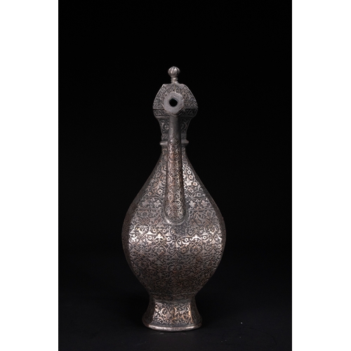 37 - A Safavid Tinned Copper Ewer with Basin, 17th Century.

This Safavid set comprises a tinned copper e... 