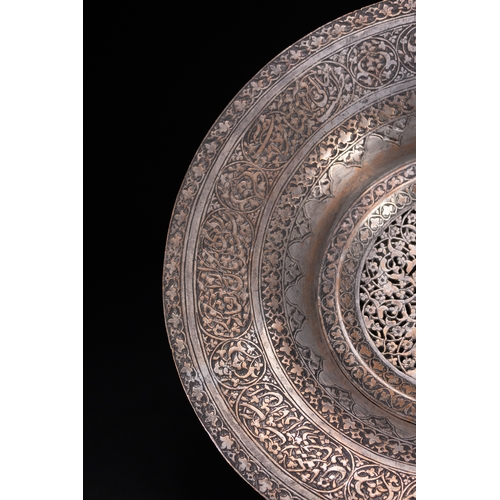 37 - A Safavid Tinned Copper Ewer with Basin, 17th Century.

This Safavid set comprises a tinned copper e... 