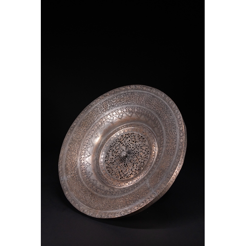 37 - A Safavid Tinned Copper Ewer with Basin, 17th Century.

This Safavid set comprises a tinned copper e... 