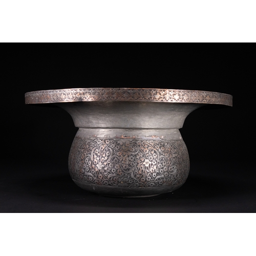 37 - A Safavid Tinned Copper Ewer with Basin, 17th Century.

This Safavid set comprises a tinned copper e... 