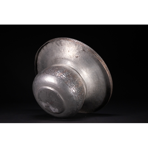 37 - A Safavid Tinned Copper Ewer with Basin, 17th Century.

This Safavid set comprises a tinned copper e... 